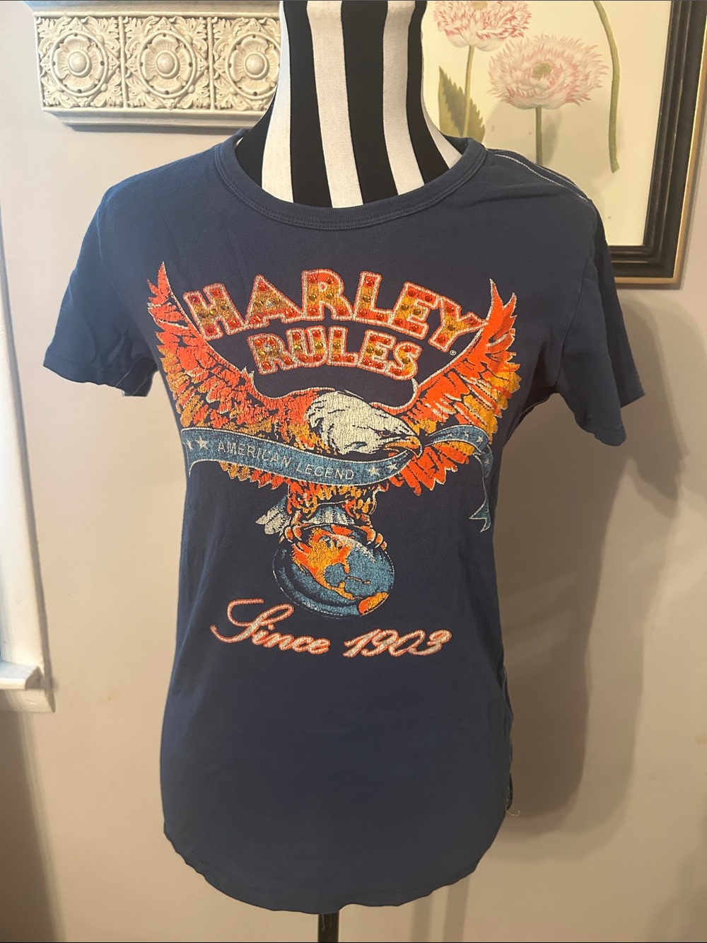Woman’s Trunk Ltd Harley-Davidson Navy Tee with Orange and Cream Eagle Graphic